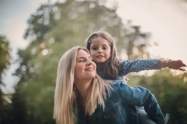 happy mum and daughter following mediation to resolve parental alienation Stockport